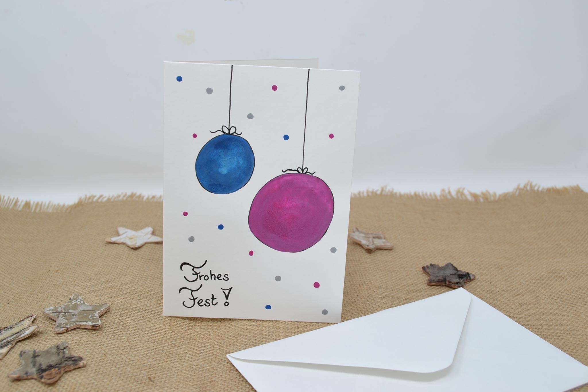 Weihnachtskarte mit Motiv Christbaumkugeln