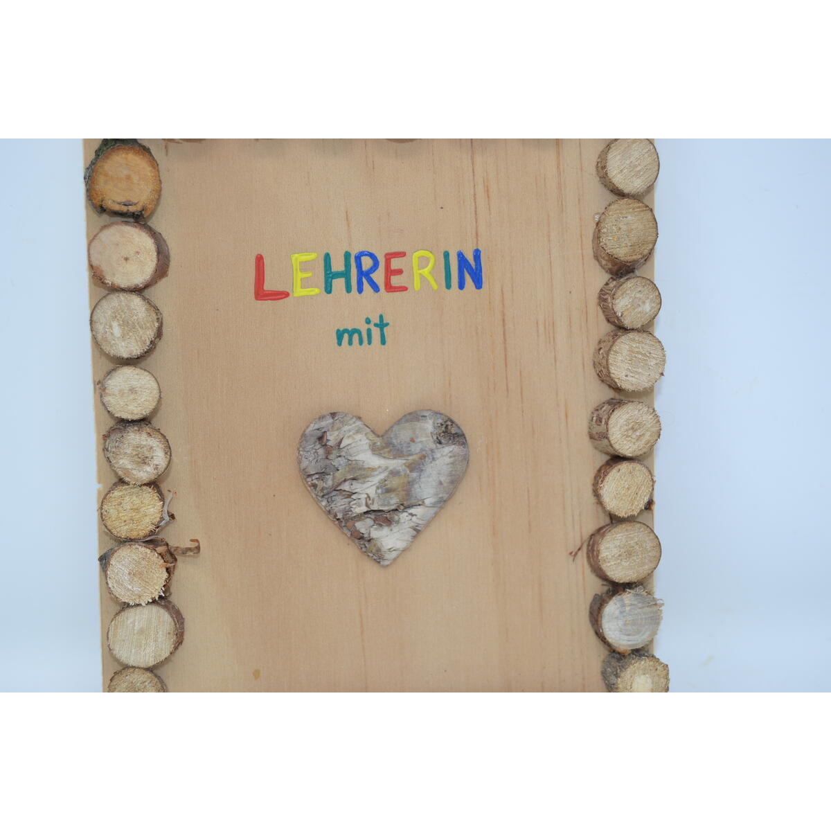 Holzbild "Lehrerin" aus Baumscheiben